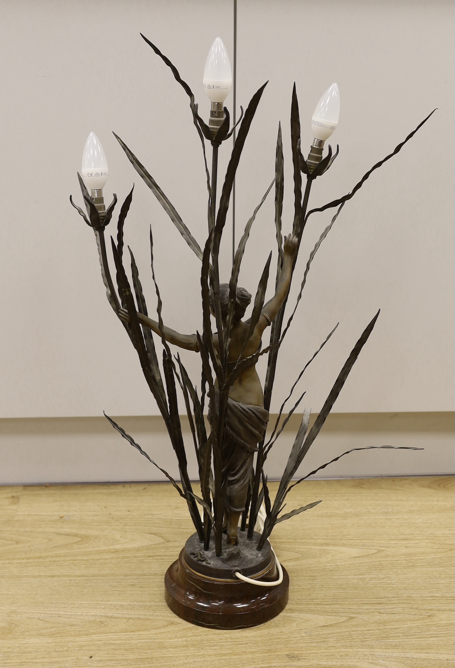 A French Art Deco-style spelter table-lamp, girl dancer amidst bullrushes, 83cm high